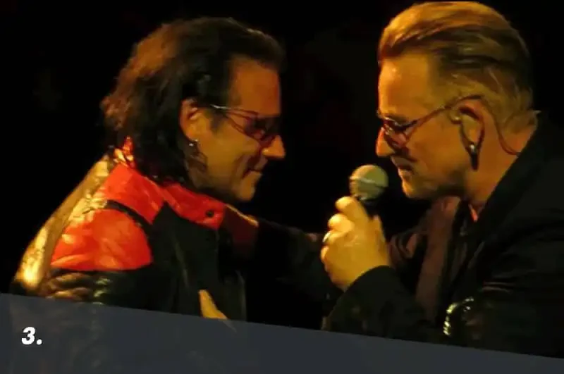 3-HP Bono of U2 and Joe Hier of Hollywood U2 live on stage together